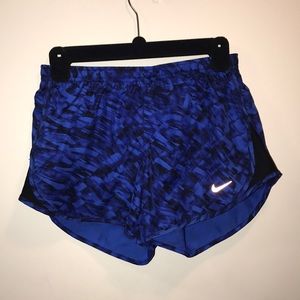 Blue patterned Nike running shorts